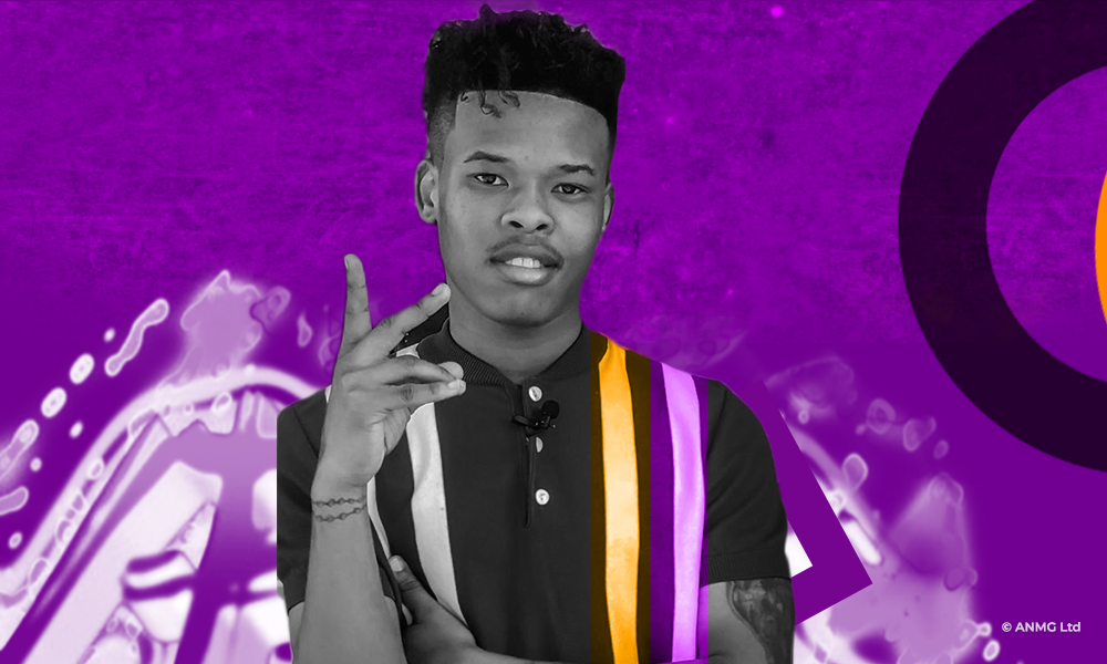 Nasty C in a black bottomed-up shirt with two fingers raised, fade haircut