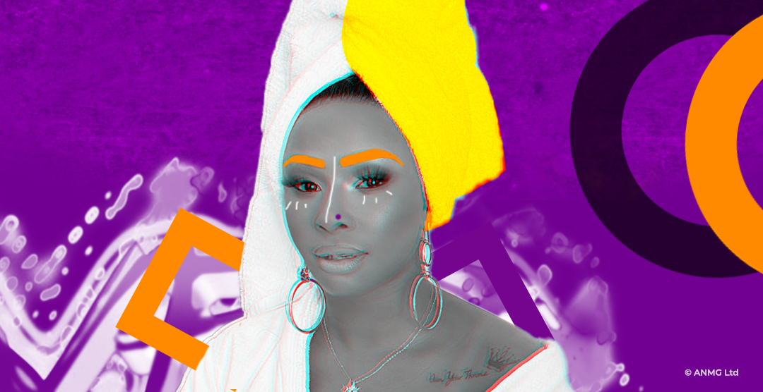 Boity Thulo in a yellow & white head wrap, loop earring and necklace