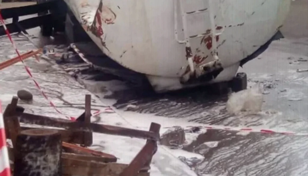 Delta Residents Risk Fire to Collect Fuel From Overturned Tanker