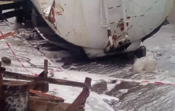 Delta Residents Risk Fire to Collect Fuel From Overturned Tanker