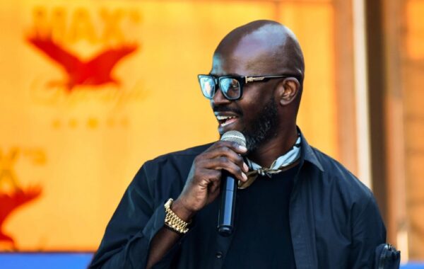 First pictures of Black Coffee and Enhle’s white wedding surface