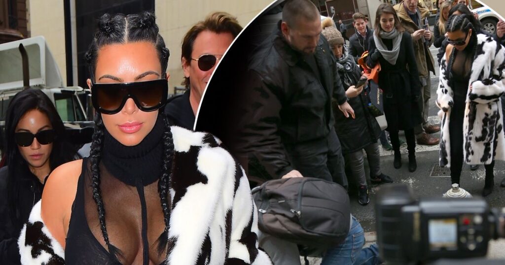 Kim Kardashian flashes breasts to thousands of fans