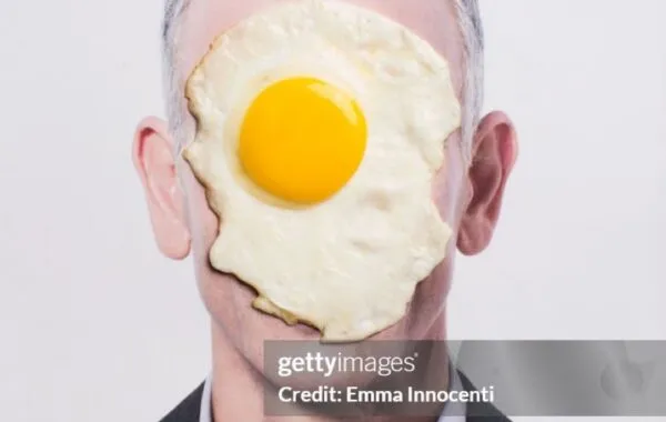 Simon Cowell smeared with egg in his face