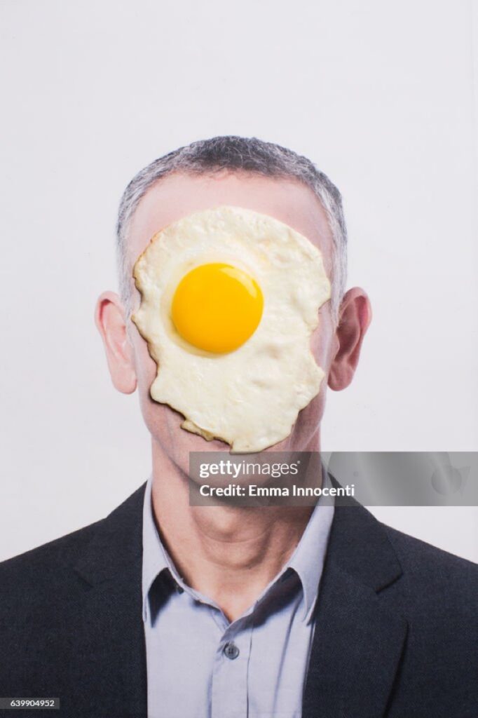 Simon Cowell smeared with egg in his face