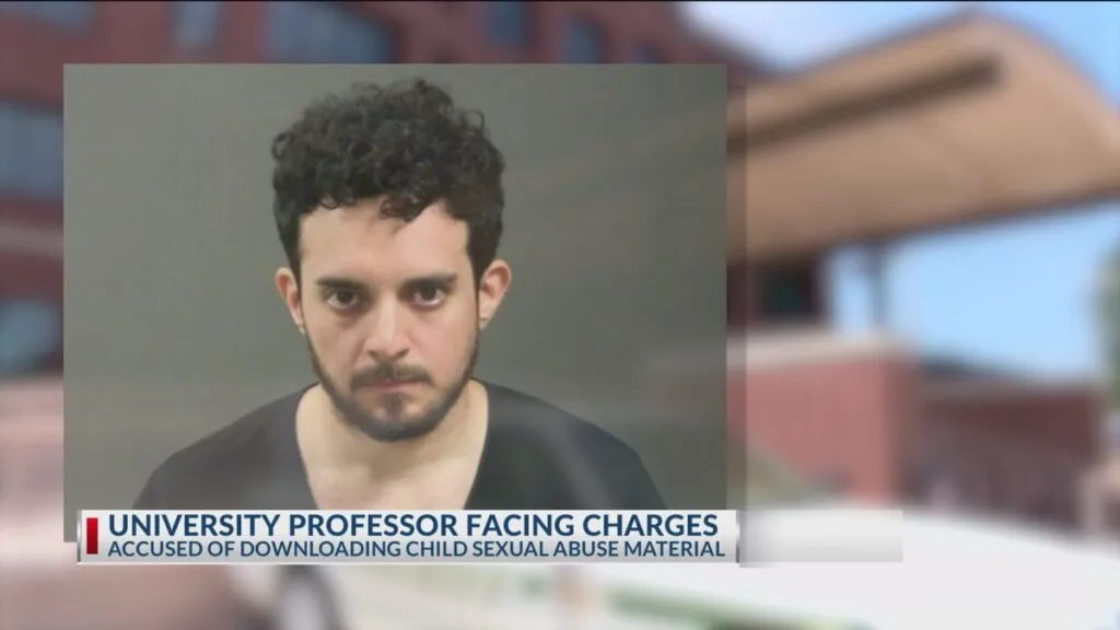 Professor to face charges