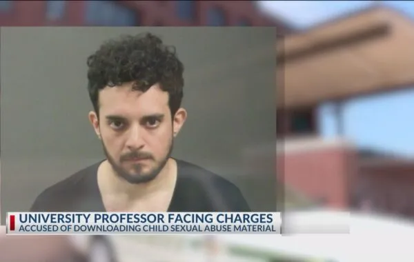 Professor to face charges